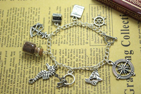 The 12pcs/lot Pirates of the Caribbean Charms Bracelet